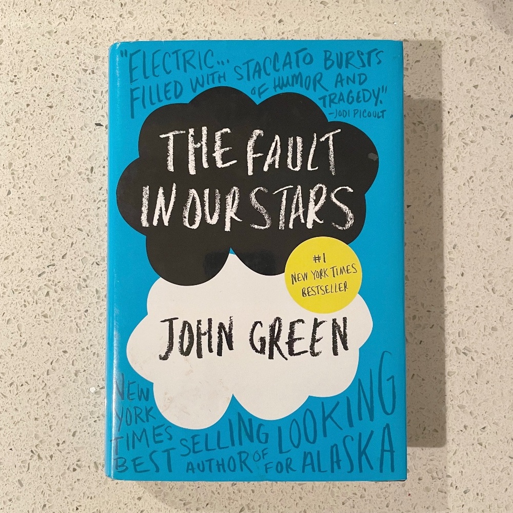 The Fault In Our Stars a novel book by John Green (Hardback Cover Book)